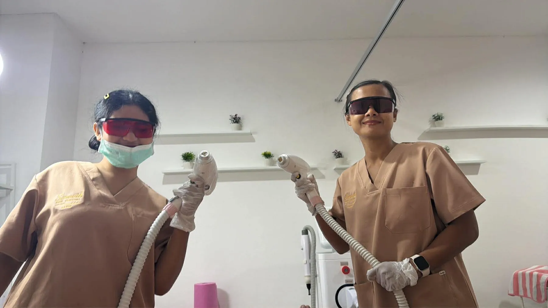 Ning and Fon at the laser in the Smooth studio